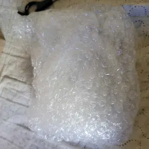 Caixa do Sérum P1 protegida em plástico bolha — unboxing A.